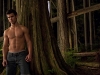Taylor Lautner stands among trees of the Capilano Park Forest during an all- night shoot, 